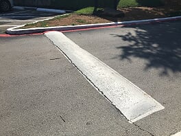 Parking lot striping and speed bump installation in Giddings, Texas